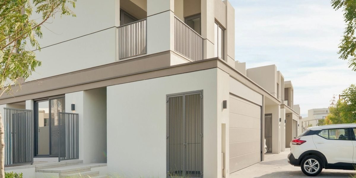 Modern Dubai residential development with landscaped walkways