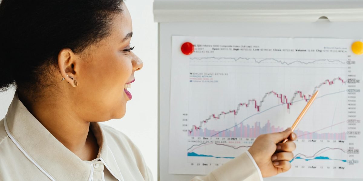 An investor and agent reviewing financial projections and market data to identify strong growth potential.