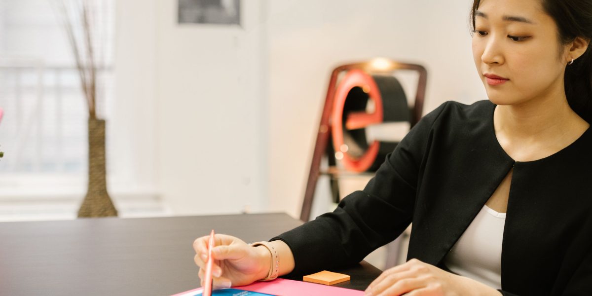 A professional discusses a report with a client, emphasizing the importance of a thorough evaluation.