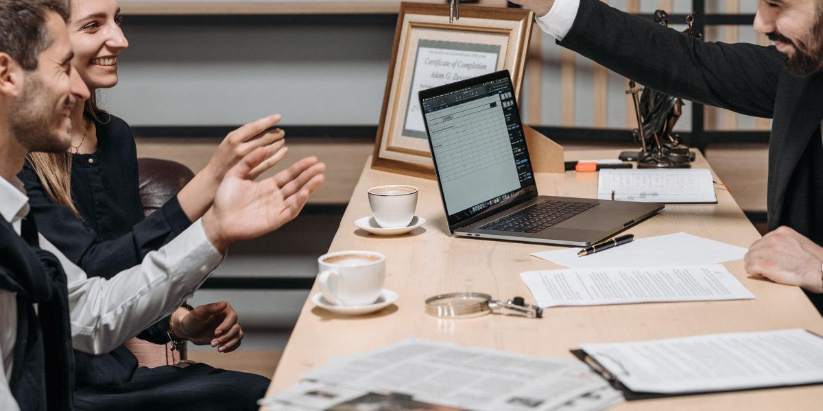 A real estate agent provides expert advice and guidance during a client meeting, discussing property options and negotiation strategies.