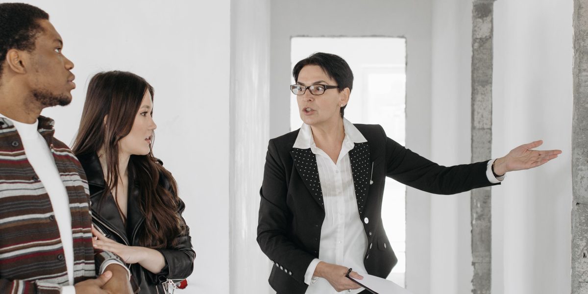 Individuals engaged in a professional yet relaxed discussion about investment prospects.