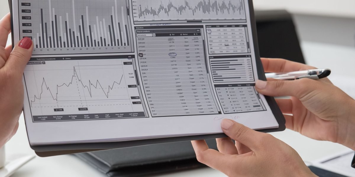 A team confidently reviewing positive financial results, reflecting strong returns.
