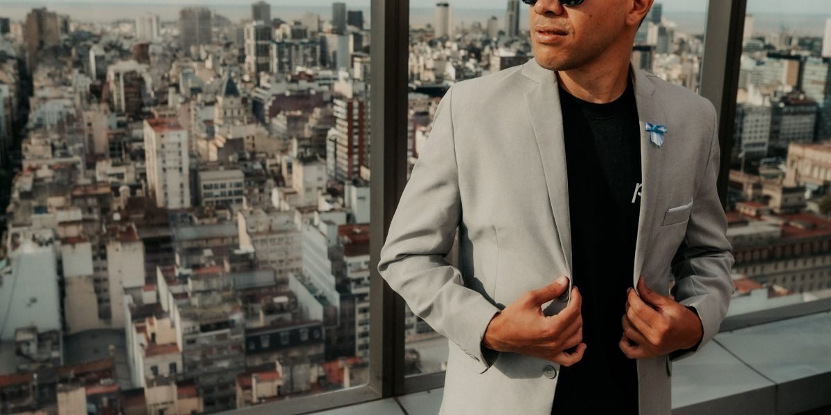 An investor looks confidently towards the Dubai skyline, symbolizing the city's allure for global property investments.